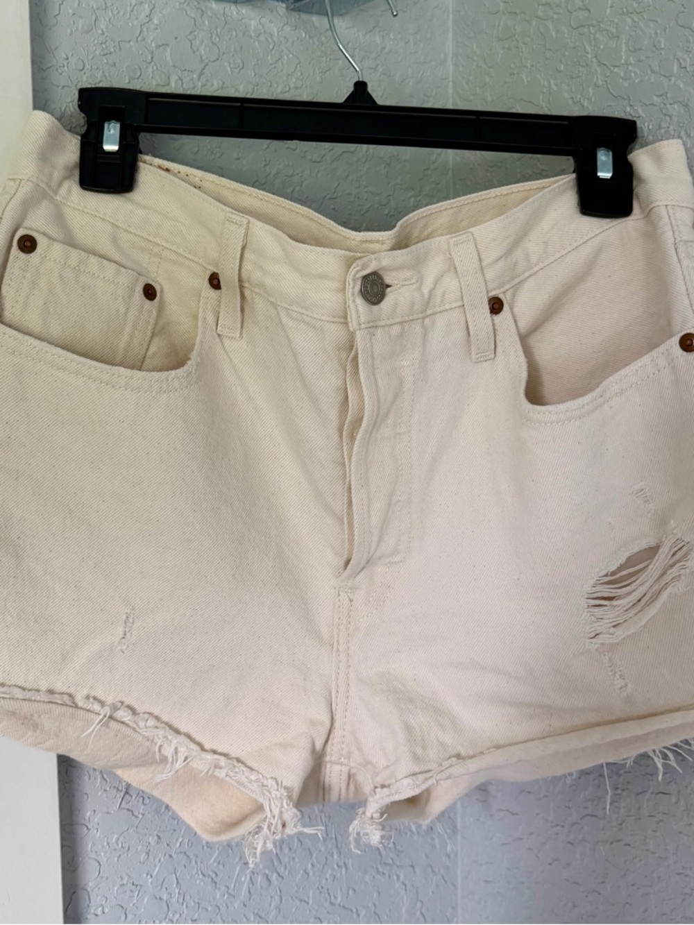 Levi's Cream Distressed Cutoff Denim Shorts